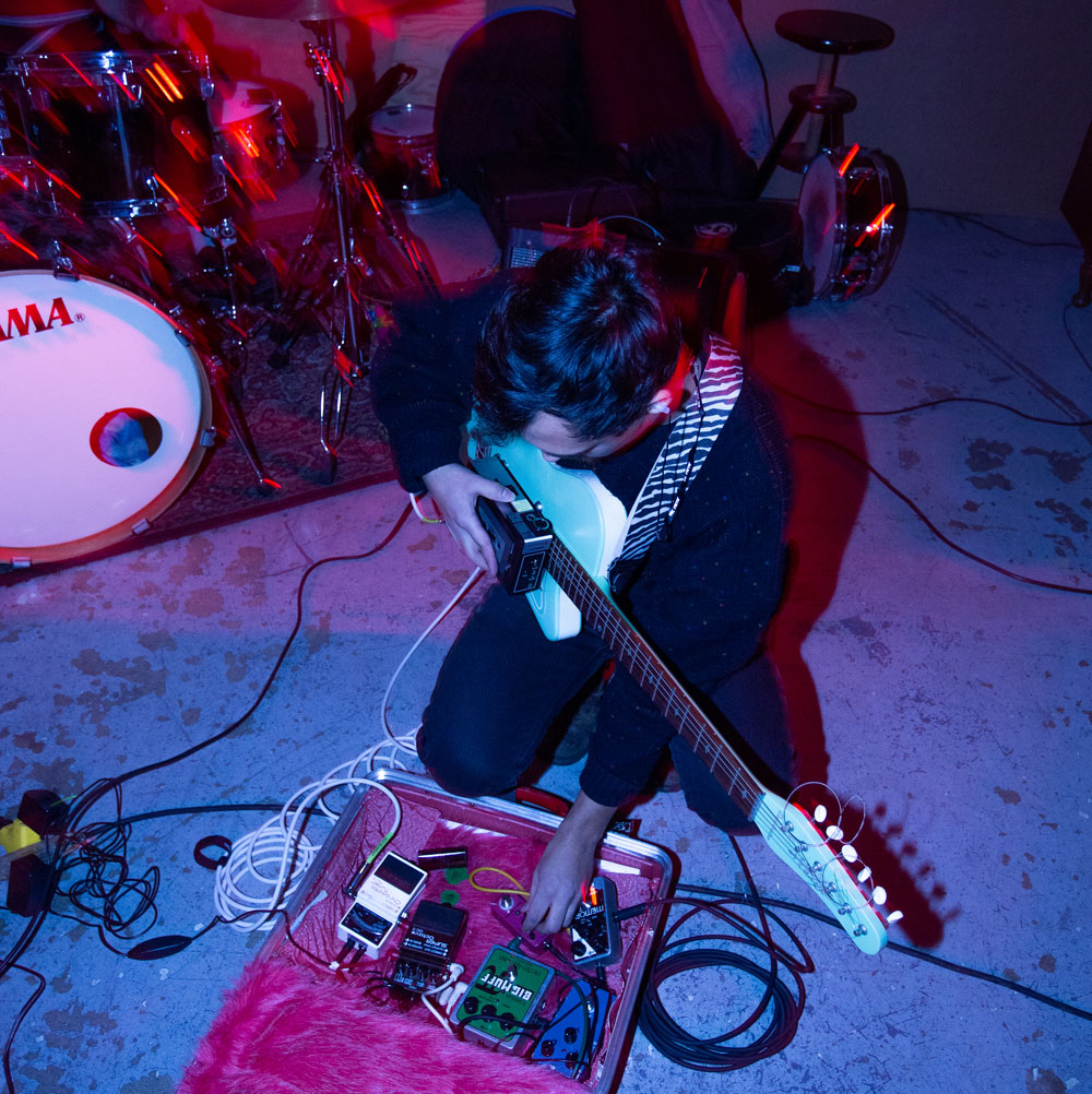 Musician Matthew Ariaratnam plays guitar