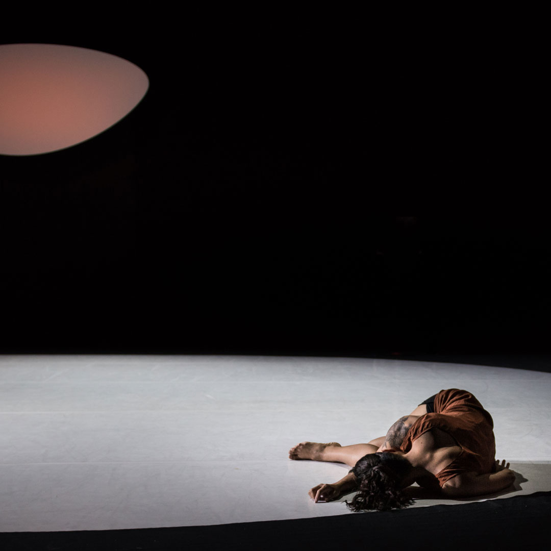Amber Funk Barton performs on stage in VAST