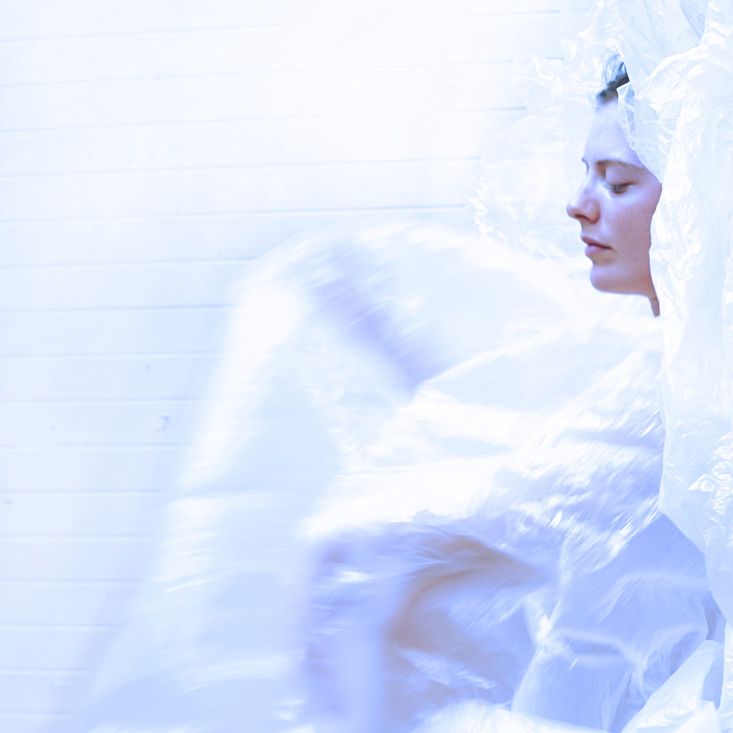 Dance artist Kellie McInnes covered in bubble wrap